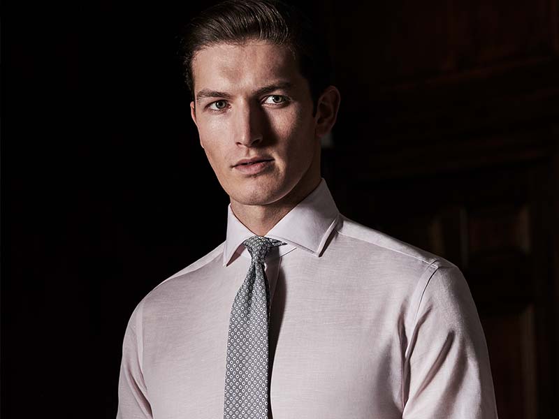 man in crisp shirt with tie on